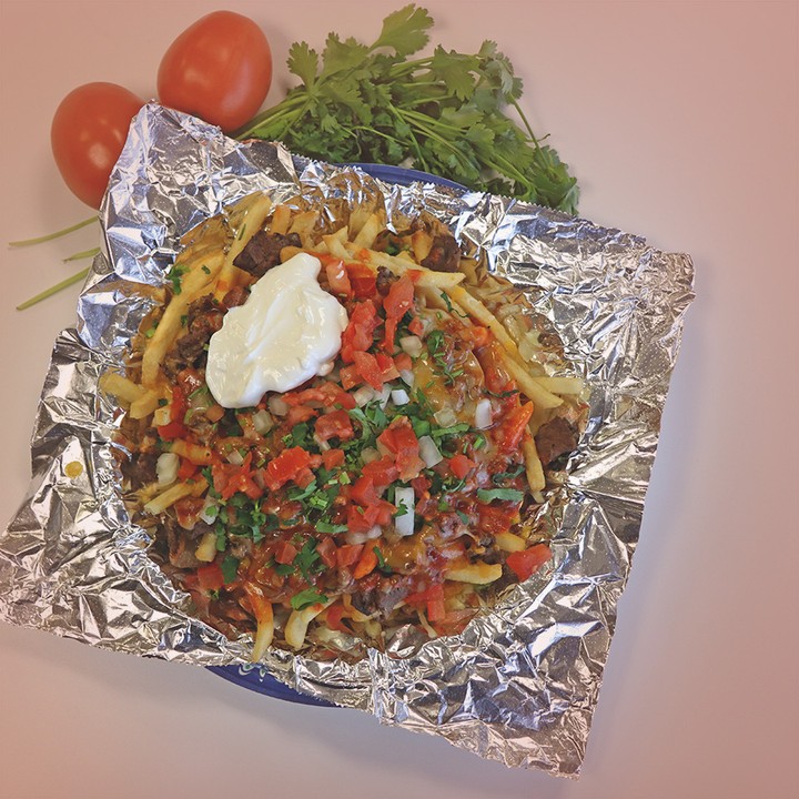 Wet burrito with enchilada sauce and cheese