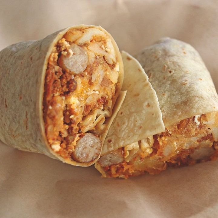 Loaded nachos with guacamole and sour cream